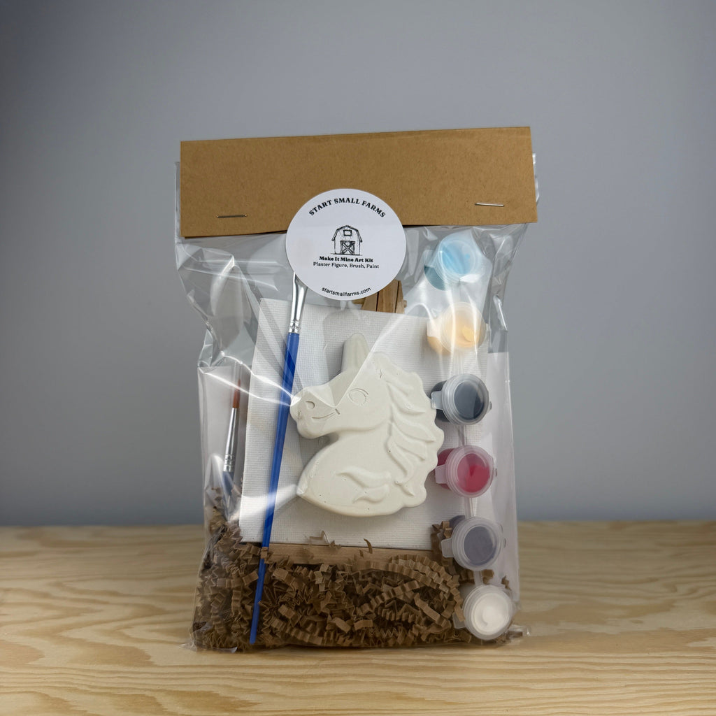 Make It Mine Kit, Display Figure with Easel in the Unicorn design, with a mini canvas, wooden easel, paint pots and a brush