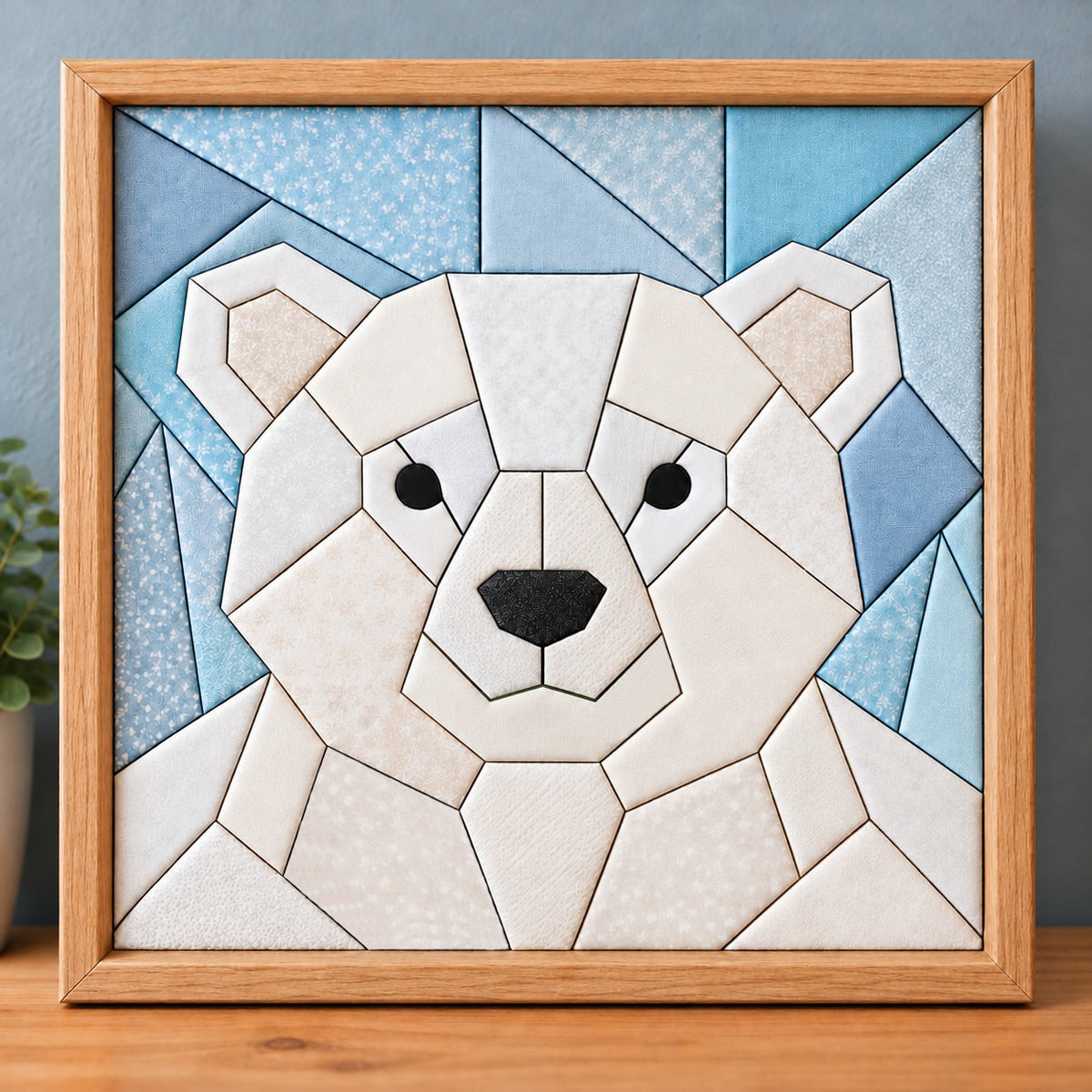 The same chunky polar bear design in a natural wood frame, standing on a wooden shelf.