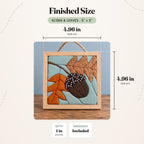 Size guide for the Acorn & Leaves 5 inch kit: the finished piece in its natural wood shadowbox measures 4.96 in (12.6 cm) wide and tall and 1 in (2.5 cm) deep.
