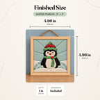 Size guide for the Winter Penguin 5 inch kit: the finished piece in its natural wood shadowbox measures 4.96 in (12.6 cm) wide and tall and 1 in (2.5 cm) deep.