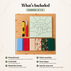 What's included in the Mushroom kit, laid out on a wood table: the printed board, fabric swatches, a craft knife and a seam ripper. The shadowbox frame and the step-by-step card are not pictured.